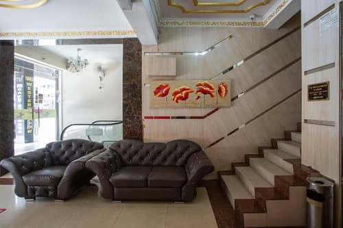 Capital O Hotel Grand Orchard