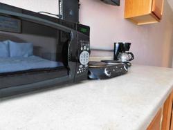 Apm Inn & Suites