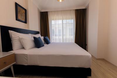Kamer Suites & Hotel