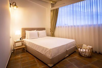 Guzi Rooms & Suites